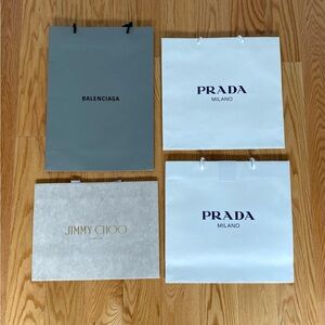 Four designer’s shopping bags